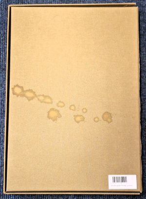 Back of slipcase of West European Orchids, showing stain marks